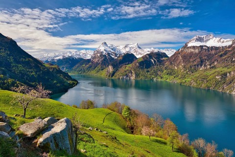 View of Lake Uri and snow-covered mountains Gitschen and Uri-Rotstock