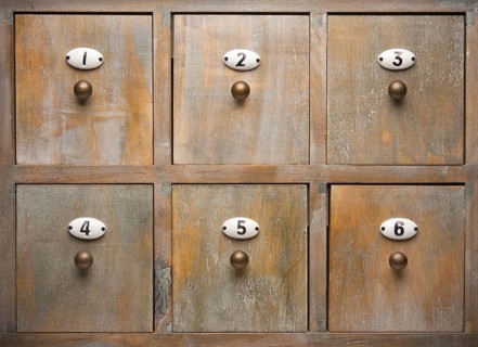 Antique wood filing cabinet drawers image