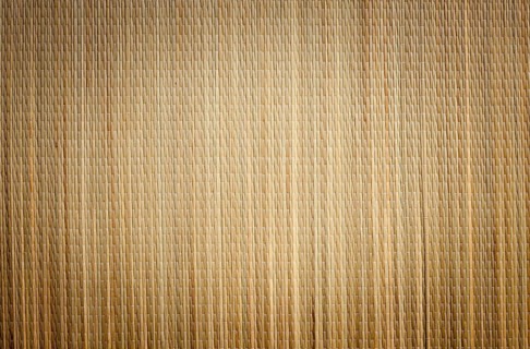 Bamboo mat background image with vignette ready for your own text