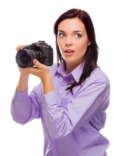 Attractive mixed-race young woman with DSLR camera isolated on a white background