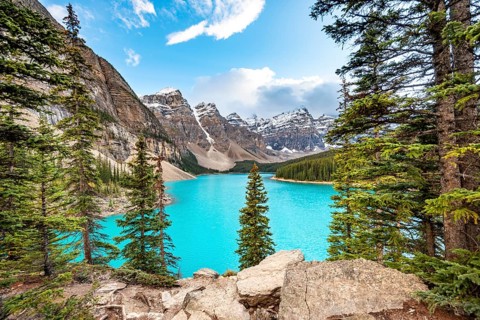 Mountain range behind turquoise glacial lake