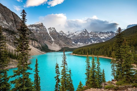 Mountain range behind turquoise glacial lake