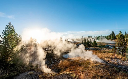 View of steaming hot springs in the morning sun