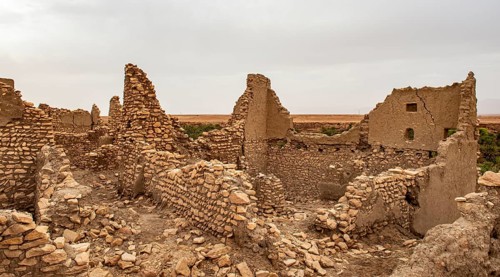 Ruins of the ancient city at the oasis Source Bleu