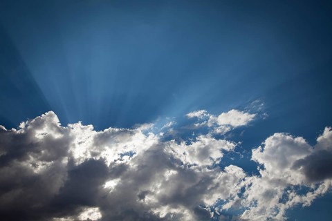Beautiful dramatic storm clouds with silver lining and light rays with room for your own text or graphics