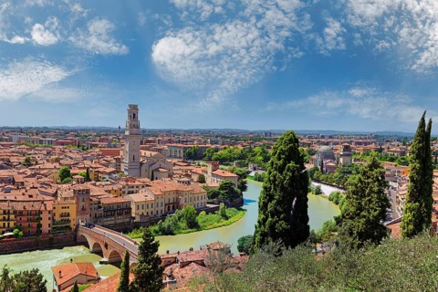 City view Verona with the stone bridge Ponte Pietra and the river Adige
