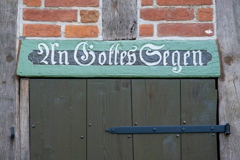 Half-timbered house in the round village of Satemin