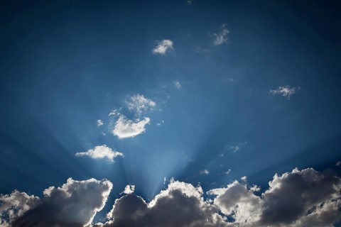 Beautiful dramatic storm clouds with silver lining and light rays with room for your own text or graphics