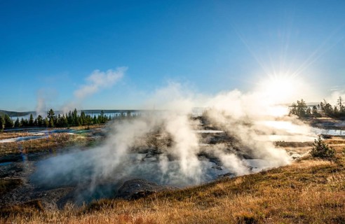 View of steaming hot springs in the morning sun