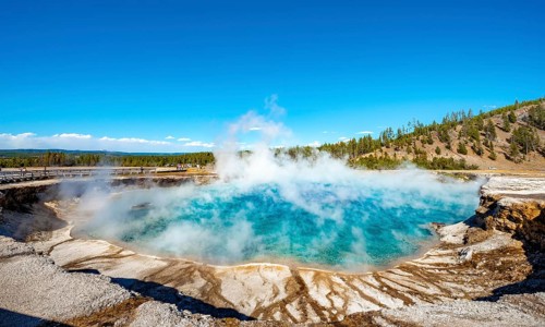 Hot spring with steaming turquoise water