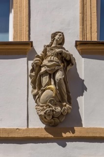 Sculpture of Maria immaculata on a residential house