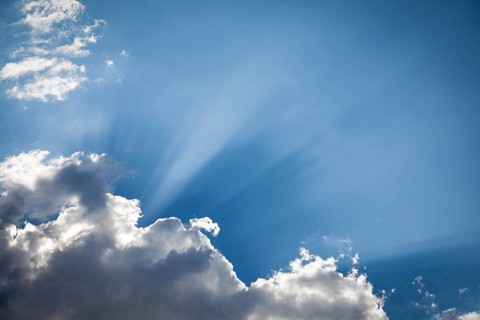 Beautiful dramatic storm clouds with silver lining and light rays with room for your own text or graphics