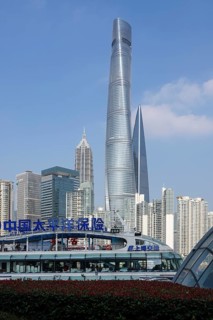 View over the Huangpu River to the skyline of the special economic zone Pudong with the skyscrapers Jin Mao Tower