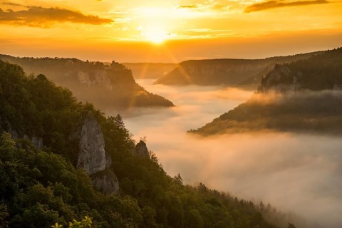 View from Eichfelsen to Werenwag Castle with morning fog