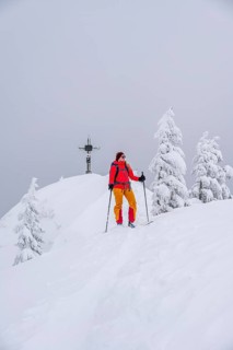 Young woman on ski tour