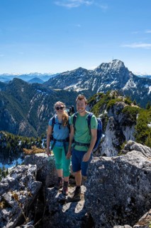 Two hikers on the summit of Breitenstein