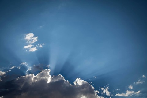 Beautiful dramatic storm clouds with silver lining and light rays with room for your own text or graphics