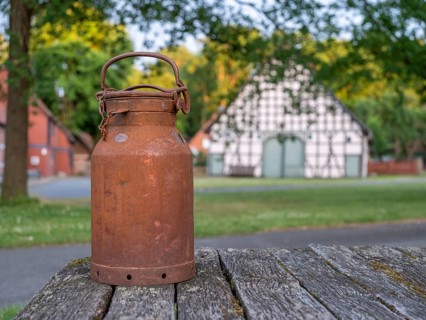 Old milk can in the village center of the Rundlingsdorf Luebeln