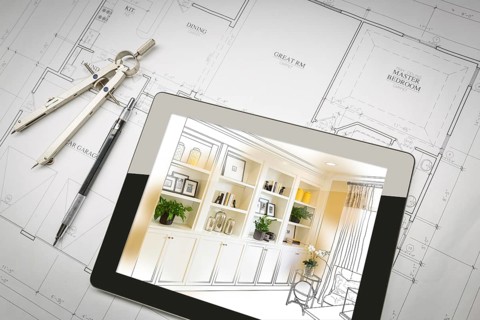 Computer tablet with finished built-in shelves and cabinets over house plans