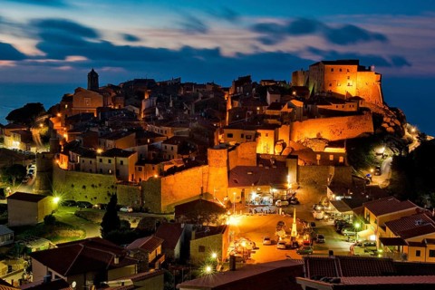 Twilight over medieval village Giglio Castello