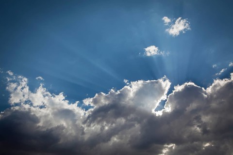 Beautiful dramatic storm clouds with silver lining and light rays with room for your own text or graphics