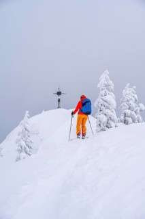 Young woman on ski tour