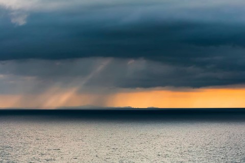 Rain clouds at sunset