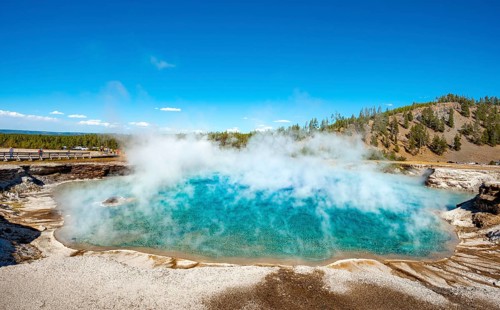 Hot spring with steaming turquoise water
