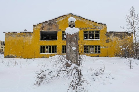 Destroyed Lenin statue in the abandoned mining city Kadykchan
