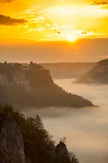View from Eichfelsen to Werenwag Castle with morning fog