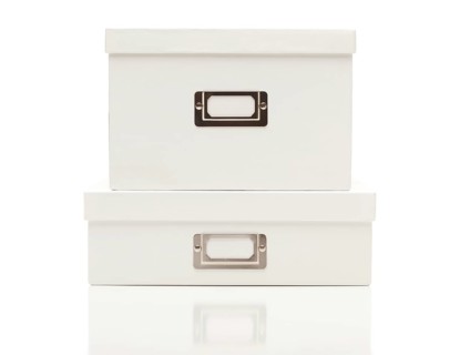 Stacked blank white file boxes with lids isolated on a white background ready for your own message