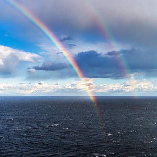 Double rainbow over the sea