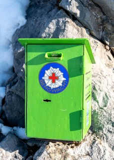 Donation box of the mountain rescue service at a mountain