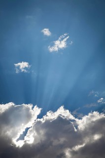 Beautiful dramatic storm clouds with silver lining and light rays with room for your own text or graphics