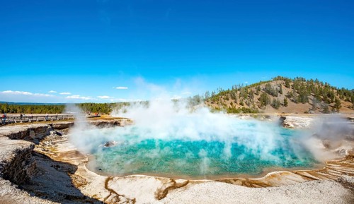 Hot spring with steaming turquoise water