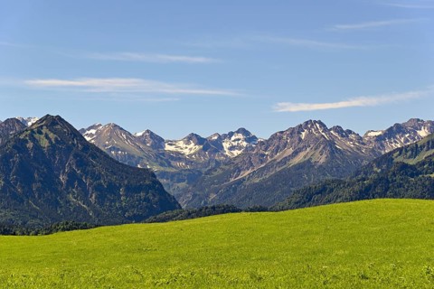 View from the meadows near the village Reichenbach to the mountain panorama of the Allgaeu Alps