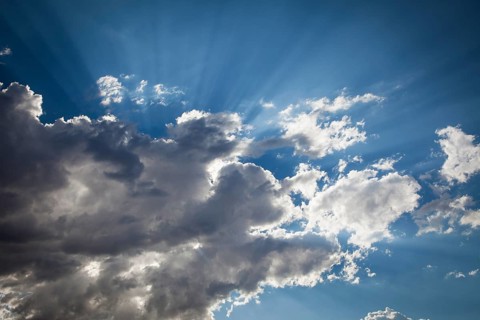 Beautiful dramatic storm clouds with silver lining and light rays with room for your own text or graphics
