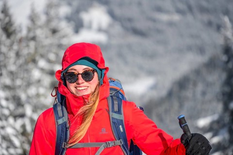 Young woman on ski tour