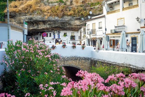 White washed houses built under the rock in Setenil de las Bodegas