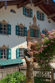 Museum of local history and figure of Pan with wild roses