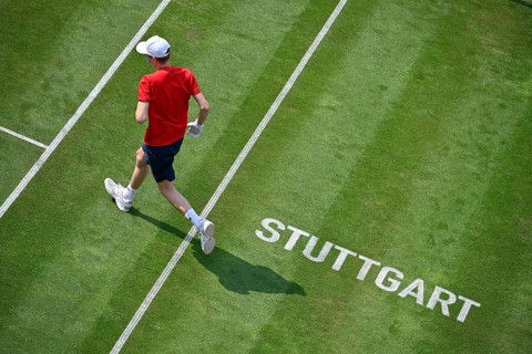 Ball boy on grass court