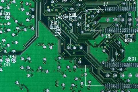Tracks and solder joints on a motherboard of a computer
