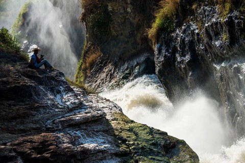 Man sitting on top of the Murchison Falls