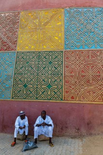 Men sitting at the entrance to Gidan Rumfa