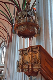 Carved pulpit in the renovated Nikolaikirche