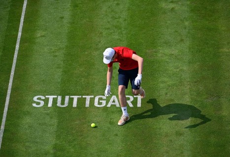 Ball boy on grass court