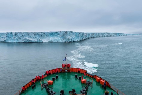 Icebreaker apporaching a massive glacier on Mc Clintok or Klintok Island
