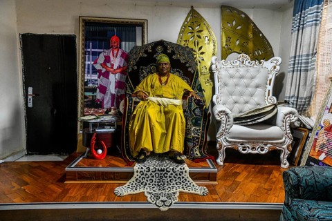 The king of Owo in his throne