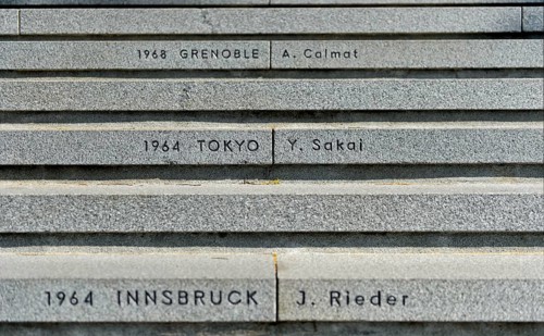Stairs to the Olympic Museum with the venues of the Olympic Games and the names of the last torchbearer