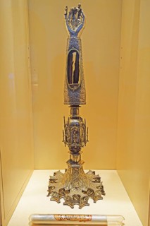 Golden monstrance with forearm bone as relic